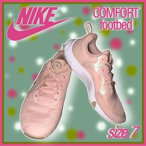 light pink NIKE low top running SNEAKERS with comfort footbed soles size 7